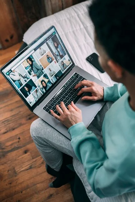 Mini shopping cart on laptop symbolizing online shopping and e-commerce transactions.
